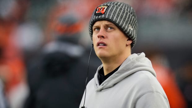 Injured Cincinnati Bengals quarterback Joe Burrow (9) walks the sideline in the fourth quarter of the NFL Week 12 game between the Cincinnati Bengals and the Pittsburgh Steelers at Paycor Stadium in Cincinnati on Sunday, Nov. 26, 2023. The Steelers took a 16-10 win over the Bengals in Cincinnati.  